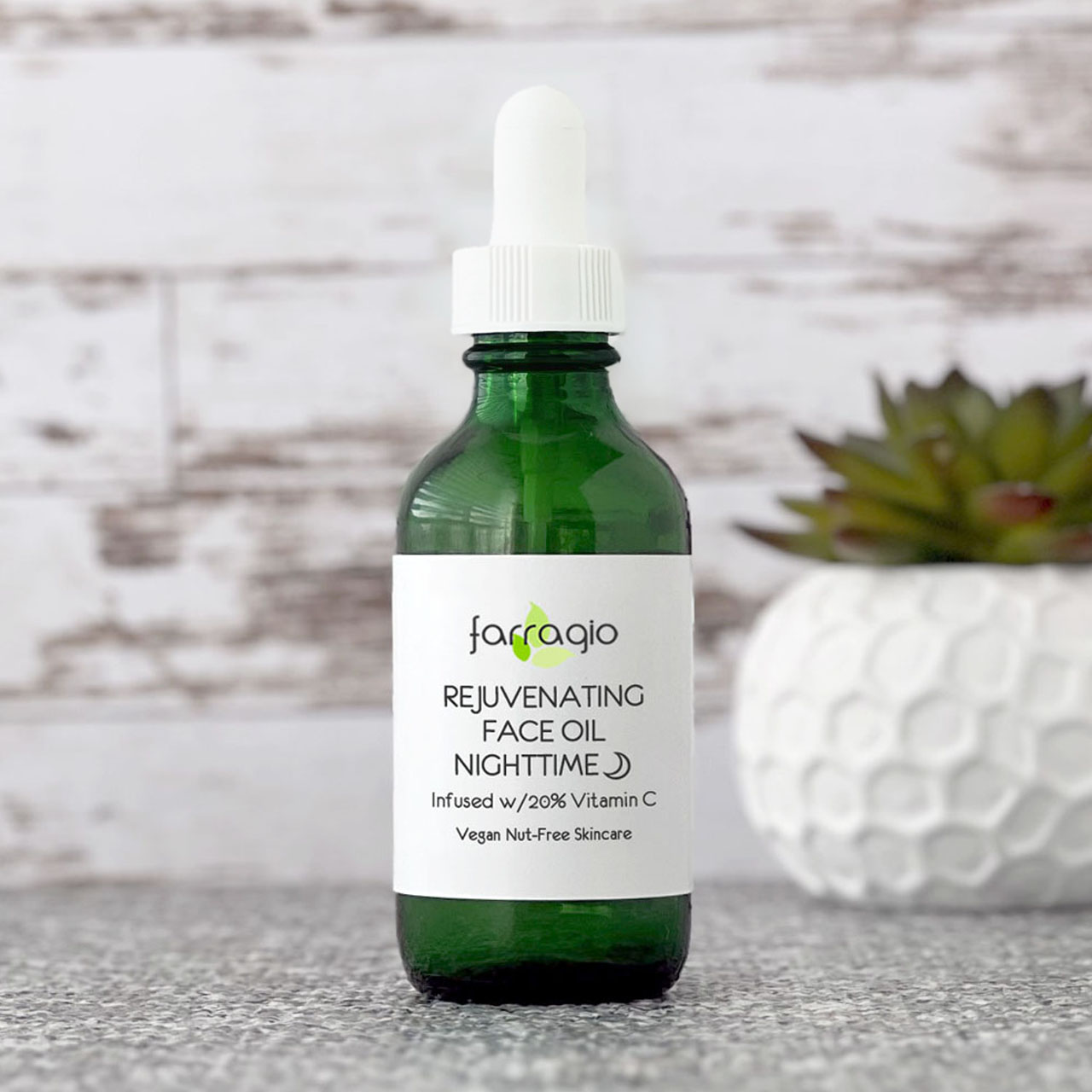 green bottle of all-natural face oil