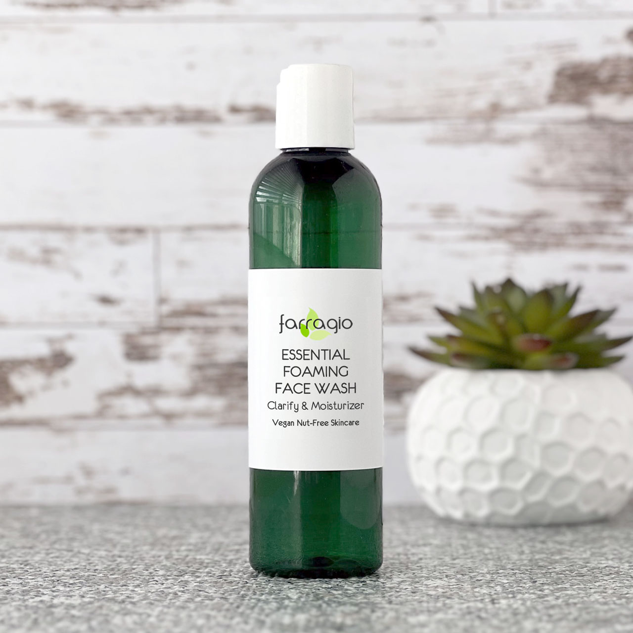 green bottle of all natural face cleanser